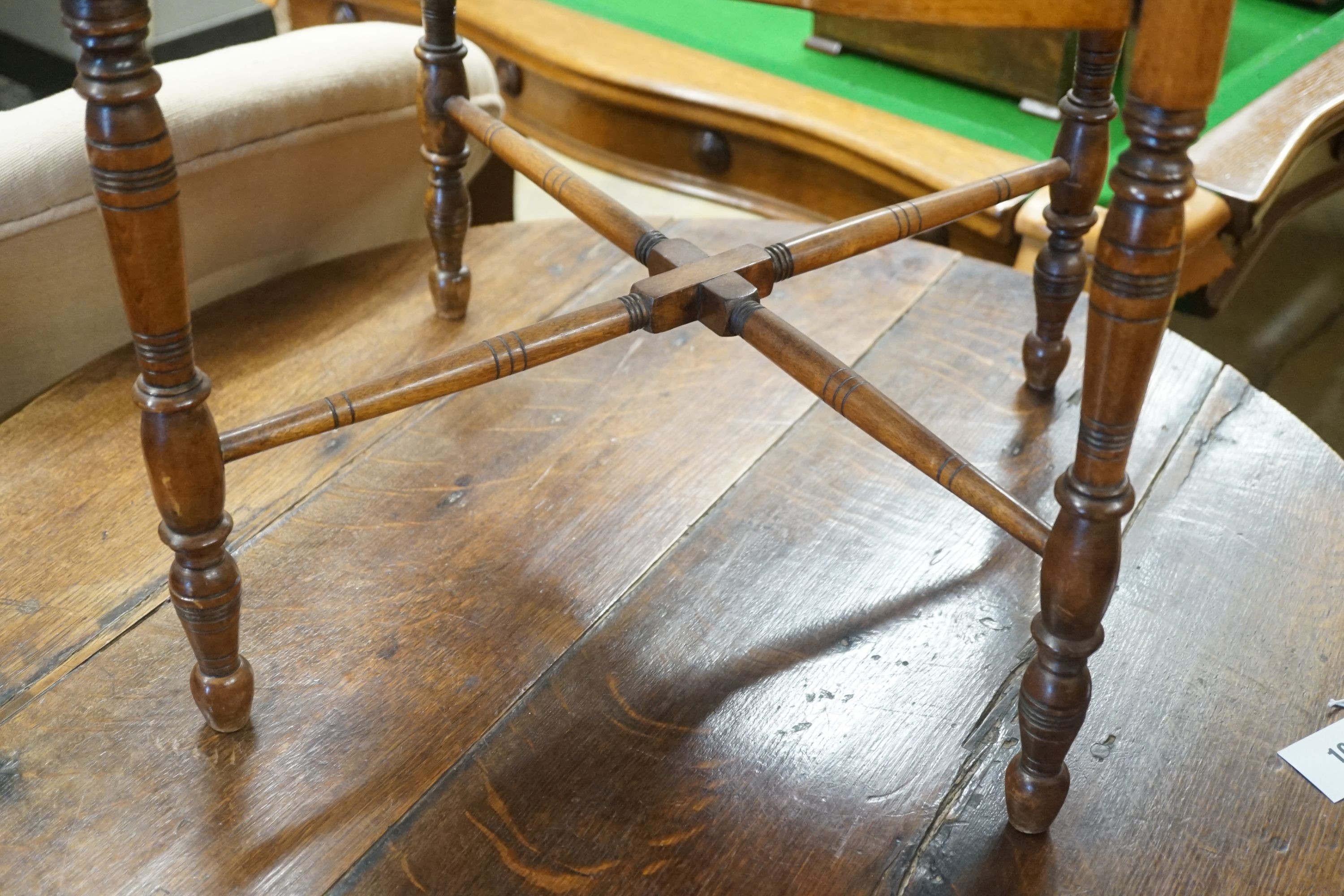 A late Victorian walnut corner elbow chair